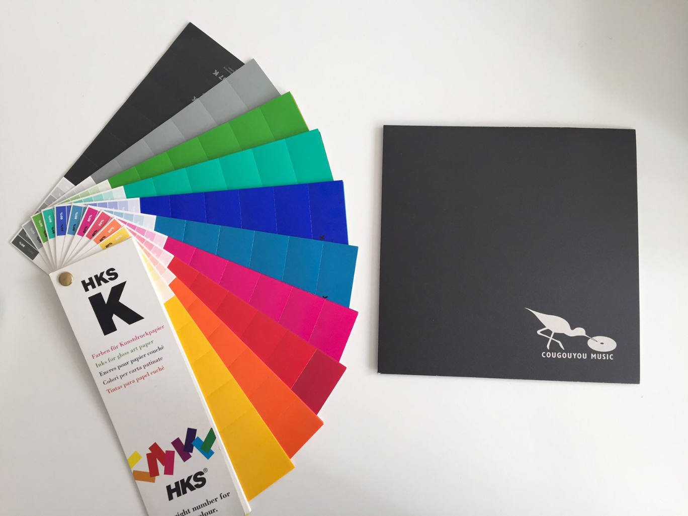 Template for the record collection, next to the color chart displaying the colours of the stickers that will be stick on the template.